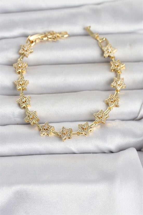 Pirinç Gold Renk Zirkon Taşlı Sıralı Yıldız Model Kadın Bileklik