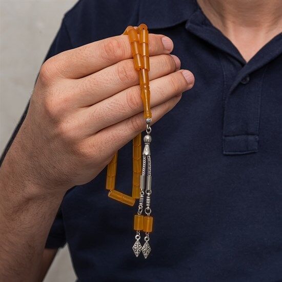 Metal Püsküllü 7x11 mm Kesme Sıkma Kehribar Tesbih