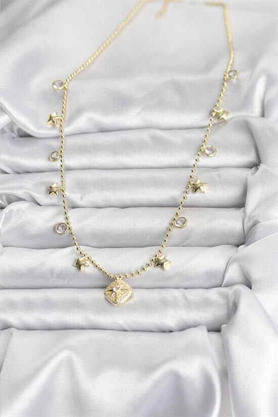 Pirinç Gold Renk Zirkon Taşlı Kutup Yıldızı Model Kadın Kolye